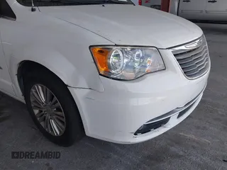 2014 Chrysler Town & Country Touring-L with VIN 2C4RC1CG2ER312444, listed as a IAAI auction lot 42050774 with 124,010 mi miles. Bid and sale history available at carsss.com. Image 6.