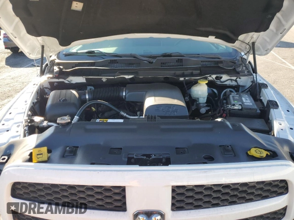 2018 Ram 1500 Express z VIN 1C6RR6KG6JS141596, wystawiony jako Copart lot #76945554 z przebiegiem 66 153 mil mil oraz Szkoda całkowita • Salvage title. Historia ofert i sprzedaży dostępna na DreamBid. Obrazek 11.