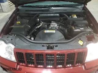 2007 Jeep Grand Cherokee Laredo with VIN 1J8GR48K27C687033, listed as a Copart auction lot 52401165 with 135,146 mi miles and Salvage Title. Bid and sale history available at carsss.com. Image 12.