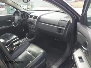 2009 Dodge Avenger SXT with VIN 1B3LC56B49N570157, listed as a IAAI auction lot 41796122 with 164,571 mi miles. Bid and sale history available at carsss.com. Image 5.