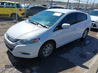 2010 Honda Insight EX with VIN JHMZE2H78AS016537, listed as a IAAI auction lot 42199484 with 273,061 mi miles and . Bid and sale history available at DreamBid. Image 2.