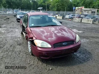2005 Ford Taurus SE z VIN 1FAFP53U35A106807, wystawiony jako Copart lot #57023025 z przebiegiem 168 727 mil mil oraz Szkoda całkowita • Salvage title. Historia ofert i sprzedaży dostępna na DreamBid. Obrazek 13.