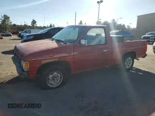 1990 Nissan Frontier with VIN 1N6SD11SXLC348469, listed as a Copart auction lot 43247865 with 242,347 mi miles and Salvage title. Bid and sale history available at DreamBid. Image 1.