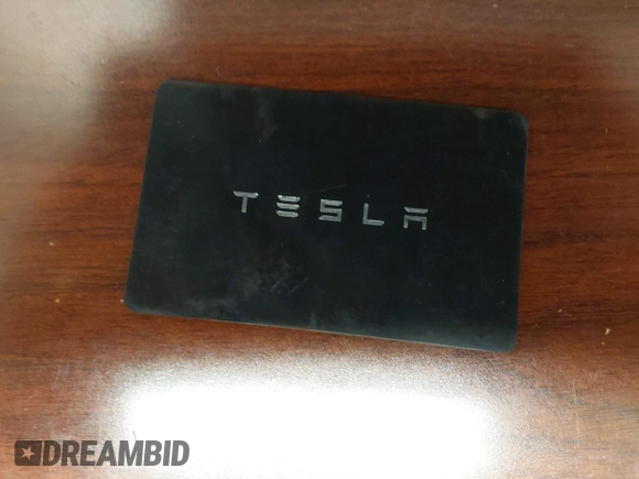 2021 Tesla Model Y Long Range with VIN 5YJYGDEE5MF203175, listed as a IAAI auction lot 41758334 with 63,387 mi miles and . Bid and sale history available at DreamBid. Image 11.
