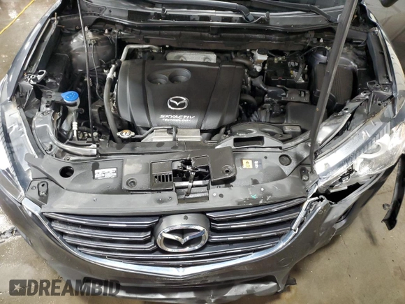 2016 Mazda CX-5 Touring z VIN JM3KE4CY5G0852073, wystawiony jako Copart lot #56599055 z przebiegiem 72 167 mil mil oraz Szkoda całkowita • Salvage title. Historia ofert i sprzedaży dostępna na DreamBid. Obrazek 12.