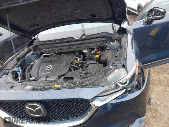 2020 Mazda CX-5 Touring with VIN JM3KFBCM9L0799502, listed as a IAAI auction lot 42007207 with 43,364 mi miles. Bid and sale history available at carsss.com. Image 10.