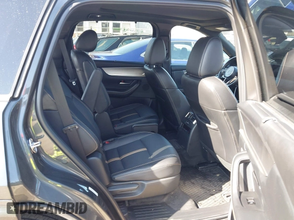 2024 Mazda CX-90 S Premium z VIN JM3KKDHC8R1112049, wystawiony jako IAAI lot #41537522 z przebiegiem 37 522 mil mil oraz . Historia ofert i sprzedaży dostępna na DreamBid. Obrazek 8.