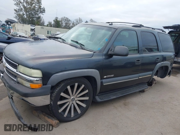 2003 Chevrolet Tahoe LS with VIN 1GNEC13T73R297770, listed as a IAAI auction lot 42071895 with 215,848 mi miles. Bid and sale history available at carsss.com. Image 2.