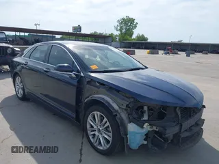 2014 Lincoln MKZ z VIN 3LN6L2GK7ER819756, wystawiony jako IAAI lot #42242399 z przebiegiem 140 483 mil mil oraz . Historia ofert i sprzedaży dostępna na DreamBid. Obrazek 1.