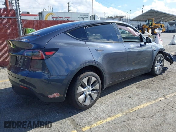 2023 Tesla Model Y Long Range with VIN 7SAYGDEE7PA192488, listed as a IAAI auction lot 42233466 with Not provided miles and . Bid and sale history available at DreamBid. Image 4.