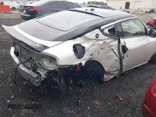 2023 Nissan Z Sport z VIN JN1BZ4AH1PM310285, wystawiony jako IAAI lot #42194303 z przebiegiem 10 957 mil mil oraz . Historia ofert i sprzedaży dostępna na DreamBid. Obrazek 6.