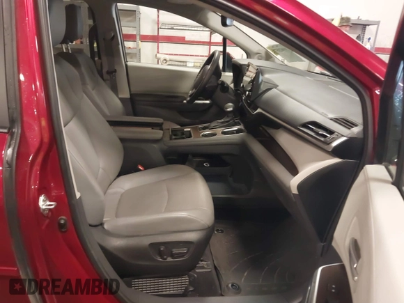 2022 Toyota Sienna XLE with VIN 5TDJRKEC2NS123067, listed as a IAAI auction lot 39982057 with 70,236 mi miles and . Bid and sale history available at DreamBid. Image 5.