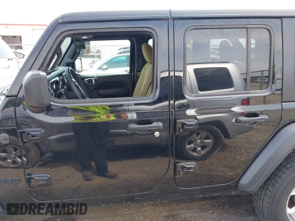 2023 Jeep Wrangler Sport S with VIN 1C4HJXDN6PW599895, listed as a IAAI auction lot 42242107 with 53,980 mi miles and . Bid and sale history available at DreamBid. Image 14.