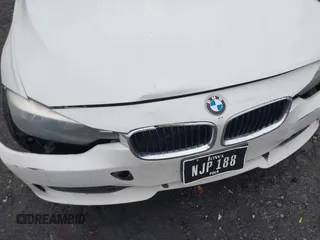 2015 BMW 3 Series 320i with VIN WBA3B1C51FP831380, listed as a IAAI auction lot 41044053 with 187,660 mi miles. Bid and sale history available at carsss.com. Image 18.