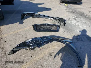 2019 Bentley Bentayga V8 z VIN SJAAM2ZV5KC024154, wystawiony jako Copart lot #74990344 z przebiegiem 41 589 mil mil oraz Szkoda całkowita • Salvage title. Historia ofert i sprzedaży dostępna na DreamBid. Obrazek 13.