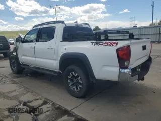 2018 Toyota Tacoma SR with VIN 5TFCZ5AN3JX128204, listed as a Copart auction lot 53970865 with 76,986 mi miles and Salvage Title. Bid and sale history available at DreamBid. Image 2.