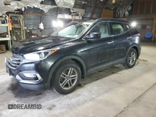 2017 Hyundai Santa Fe 2.4L with VIN 5NMZUDLB1HH013853, listed as a Copart auction lot 62577715 with 65,336 mi miles and Salvage title. Bid and sale history available at DreamBid. Image 1.