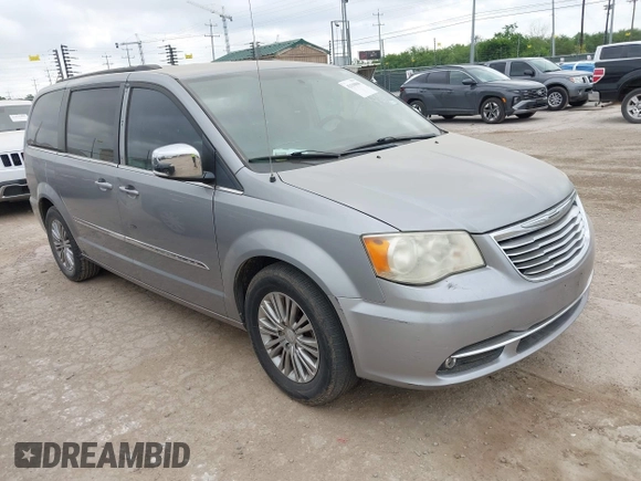 2013 Chrysler Town & Country Touring L with VIN 2C4RC1CG7DR779762, listed as a IAAI auction lot 42118866 with 151,833 mi miles and . Bid and sale history available at DreamBid. Image 1.