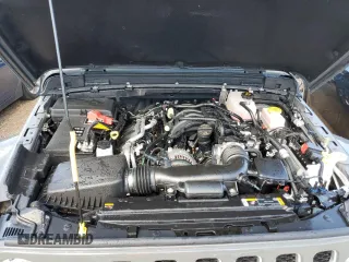 2022 Jeep Wrangler Unlimited Sahara Altitude with VIN 1C4HJXEG5NW174021, listed as a Copart auction lot 55200532 with Not provided miles and Salvage title. Bid and sale history available at DreamBid. Image 7.
