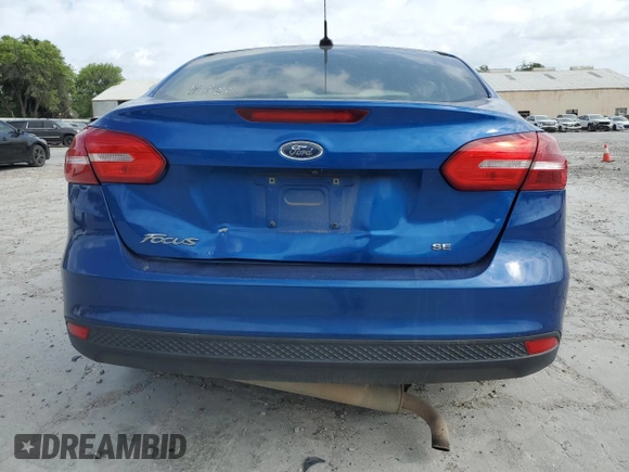2018 Ford Focus SE with VIN 1FADP3F24JL205544, listed as a Copart auction lot 53555065 with 63,810 mi miles and Clean title. Bid and sale history available at DreamBid. Image 6.