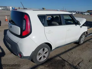 2015 Kia Soul with VIN KNDJN2A24F7181251, listed as a IAAI auction lot 41988230 with 128,894 mi miles. Bid and sale history available at carsss.com. Image 4.