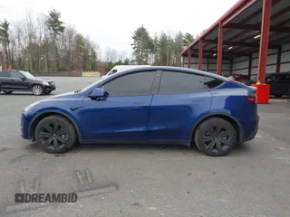 2021 Tesla Model Y Long Range with VIN 5YJYGDEE9MF071120, listed as a IAAI auction lot 40870088 with 73,438 mi miles and . Bid and sale history available at carsss.com. Image 15.