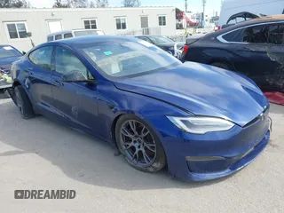 2021 Tesla Model S Long Range with VIN 5YJSA1E51MF442874, listed as a IAAI auction lot 39406495 with 36,127 mi miles and . Bid and sale history available at DreamBid. Image 1.