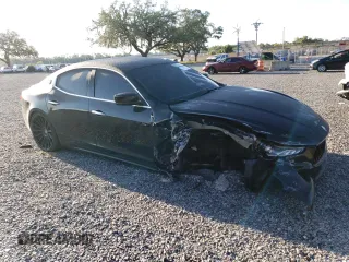 2015 Maserati Ghibli S Q4 with VIN ZAM57RTA1F1134623, listed as a Copart auction lot 47982333 with 91,615 mi miles. Bid and sale history available at carsss.com. Image 4.