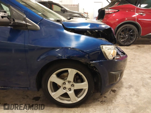 2012 Chevrolet Sonic LTZ z VIN 1G1JE5SB4C4214450, wystawiony jako IAAI lot #42207345 z przebiegiem 120 152 mil mil oraz . Historia ofert i sprzedaży dostępna na DreamBid. Obrazek 18.