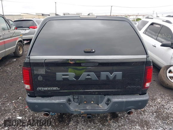 2016 Ram 1500 Rebel z VIN 1C6RR7YT0GS100285, wystawiony jako IAAI lot #42346719 z przebiegiem 103 309 mil mil oraz . Historia ofert i sprzedaży dostępna na DreamBid. Obrazek 16.