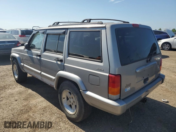 2001 Jeep Cherokee Sport z VIN 1J4FF58S61L540796, wystawiony jako Copart lot #62384895 z przebiegiem 209 294 mil mil oraz Czysty tytuł • Clean title. Historia ofert i sprzedaży dostępna na DreamBid. Obrazek 2.
