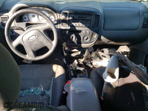 2004 Ford Escape XLS with VIN 1FMYU92134KA21707, listed as a Copart auction lot 72114804 with 219,518 mi miles and Salvage Title. Bid and sale history available at DreamBid. Image 8.