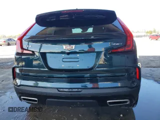 2024 Cadillac XT4 FWD Premium Luxury z VIN 1GYFZCR43RF241465, wystawiony jako Copart lot #49428795 z przebiegiem Nie podano mil oraz Szkoda całkowita • Salvage title. Historia ofert i sprzedaży dostępna na DreamBid. Obrazek 6.