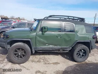 2014 Toyota FJ Cruiser with VIN JTEBU4BFXEK192640, listed as a IAAI auction lot 41349553 with 49,308 mi miles. Bid and sale history available at carsss.com. Image 14.