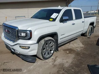 2017 GMC Sierra 1500 Denali with VIN 3GTU2PEJ5HG239623, listed as a IAAI auction lot 41783709 with 61,641 mi miles. Bid and sale history available at carsss.com. Image 17.