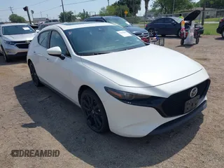 2021 Mazda 3 Premium with VIN JM1BPAML5M1402899, listed as a IAAI auction lot 42252886 with Not provided miles and . Bid and sale history available at DreamBid. Image 1.
