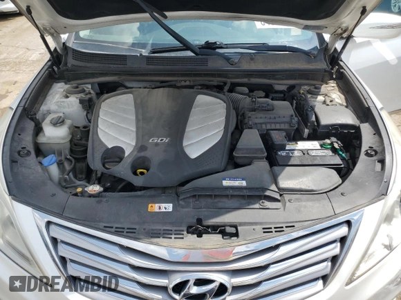2012 Hyundai Azera z VIN KMHFG4JG6CA153582, wystawiony jako Copart lot #64809485 z przebiegiem 79 425 mil mil oraz Czysty tytuł • Clean title. Historia ofert i sprzedaży dostępna na DreamBid. Obrazek 11.