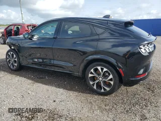2023 Ford Mustang Mach-E Premium с VIN 3FMTK3SU6PMA98088, выставлен на аукционе Copart как лот 59276155 с пробегом 30 486 миль миль и На запчасти • Non repairable. История ставок и продаж доступна на DreamBid. Изображение 2.