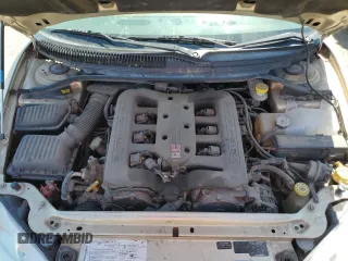 2000 Dodge Intrepid ES z VIN 2B3HD56J6YH373198, wystawiony jako Copart lot #55627115 z przebiegiem 111 624 mil mil oraz Szkoda całkowita • Salvage title. Historia ofert i sprzedaży dostępna na DreamBid. Obrazek 11.