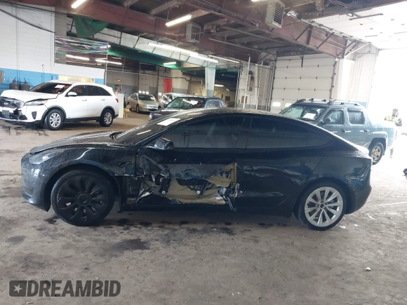 2023 Tesla Model 3 with VIN 5YJ3E1EA5PF396413, listed as a IAAI auction lot 42188639 with 57,717 mi miles and . Bid and sale history available at DreamBid. Image 14.