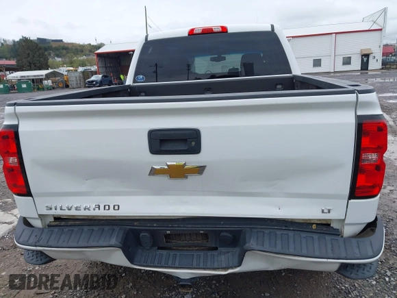 2016 Chevrolet Silverado 1500 LT with VIN 3GCUKREC0GG136136, listed as a IAAI auction lot 41971199 with 179,045 mi miles and . Bid and sale history available at DreamBid. Image 16.