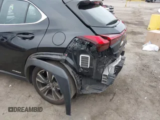 2021 Lexus UX 250h z VIN JTHX9JBHXM2049972, wystawiony jako IAAI lot #40956792 z przebiegiem 47 882 mil mil oraz . Historia ofert i sprzedaży dostępna na DreamBid. Obrazek 6.