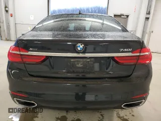 2017 BMW 7 Series 740i xDrive with VIN WBA7E4C53HGU99097, listed as a Copart auction lot 43945695 with 117,790 mi miles and Salvage Title. Bid and sale history available at carsss.com. Image 6.
