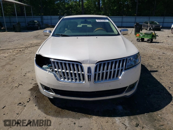 2012 Lincoln MKZ z VIN 3LNHL2GC3CR800619, wystawiony jako Copart lot #57872365 z przebiegiem 66 280 mil mil oraz Szkoda całkowita • Salvage title. Historia ofert i sprzedaży dostępna na DreamBid. Obrazek 5.
