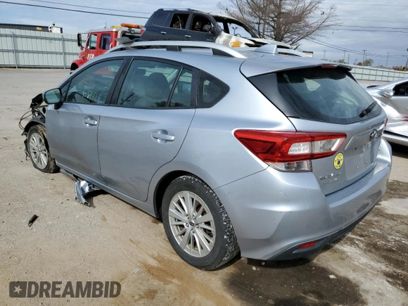 2018 Subaru Impreza Premium with VIN 4S3GTAD66J3724009, listed as a Copart auction lot 64833942 with 105,862 mi miles. Bid and sale history available at carsss.com. Image 3.