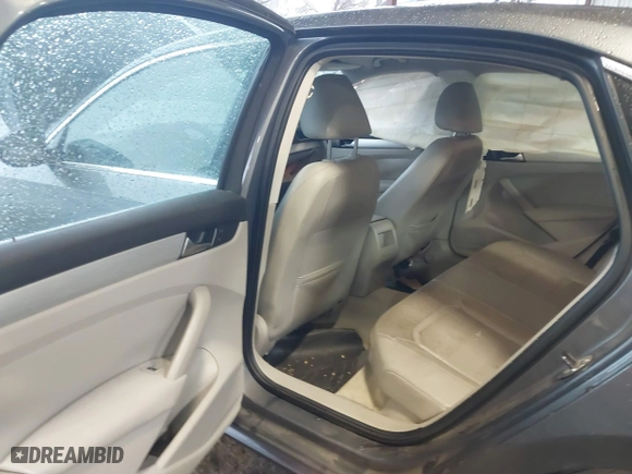 2012 Volkswagen Passat SE w/Sunroof with VIN 1VWBH7A38CC053564, listed as a IAAI auction lot 41488237 with 188,636 mi miles. Bid and sale history available at carsss.com. Image 8.
