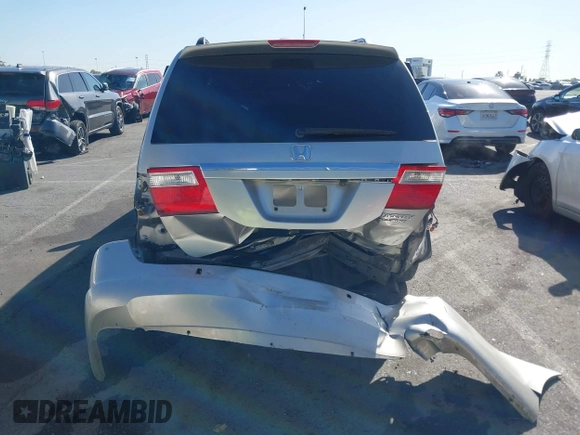 2005 Honda Odyssey TOURING with VIN 5FNRL38865B128519, listed as a IAAI auction lot 41830182 with 171,010 mi miles. Bid and sale history available at carsss.com. Image 17.
