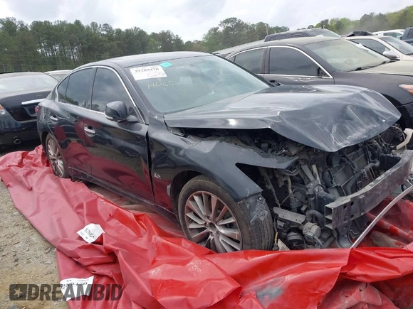 2018 Infiniti Q50 Luxe with VIN JN1EV7APXJM353659, listed as a IAAI auction lot 39289470 with 124,830 mi miles and . Bid and sale history available at DreamBid. Image 1.