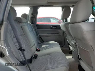 2006 Subaru Forester X with VIN JF1SG65656H709849, listed as a Copart auction lot 59811325 with 198,659 mi miles and Salvage title. Bid and sale history available at DreamBid. Image 11.
