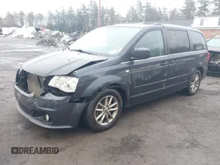 2014 Dodge Grand Caravan SXT with VIN 2C4RDGCG2ER463395, listed as a IAAI auction lot 41709948 with 137,783 mi miles and . Bid and sale history available at DreamBid. Image 2.